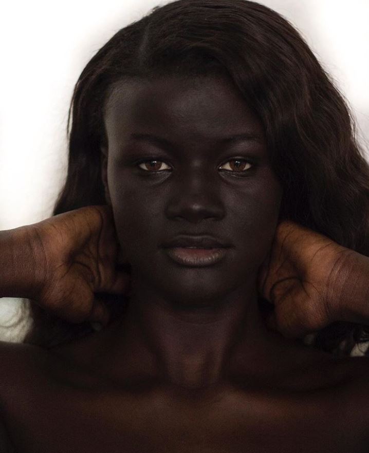 “Melanin goddess” Khoudia Diop — a model with the darkest skin in the world.