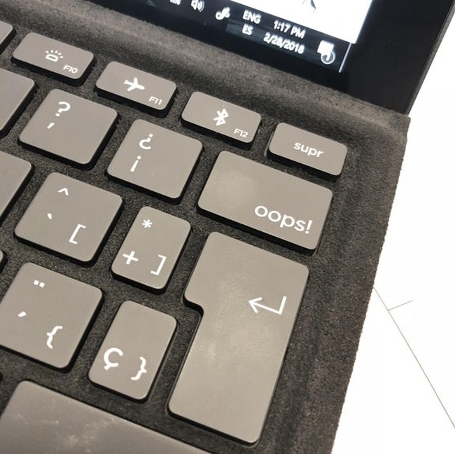 “My new keyboard has an ‘oops!’ key.”