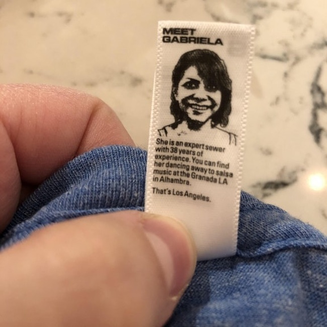 This t-shirt label has a bio of the person who sewed it.