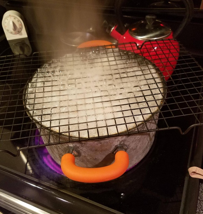 “Forget the wooden spoon, here’s a life hack that actually works: wire cooling rack.”