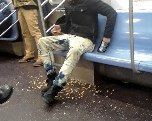 This guy on the subway is eating pistachio nuts and doesn’t care about properly getting rid of the shells.