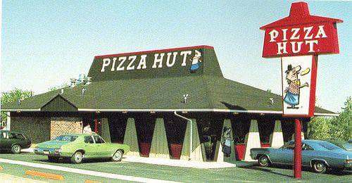 Nostalgic pic of a pizza hut restaurant using its old logo