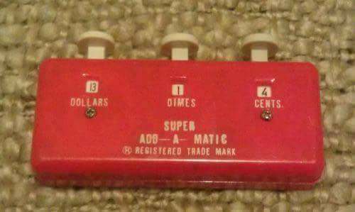 Nostalgic pic of a red add-a-matic dollar calculator