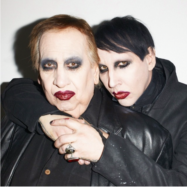 Brian Hugh Warner aka Marilyn Manson and his dad Hugh Warner in full Marilyn makeup. In an interview tied to this photo shoot, Manson, mentioned that he may have gotten his love of theatricality from his dad.  "The first time that I did see my dad in makeup was, ironically, the second concert I ever went to. He dressed as Gene Simmons and took me to the Kiss 'Dynasty' tour when I was 11. And people were asking my dad for his autograph."