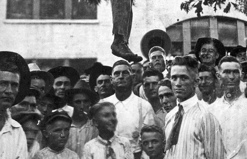 The crowd at a lynching, 1920s