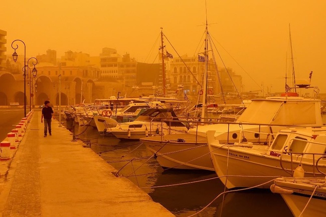 The island of Crete is being swallowed by a cloud of African dust.