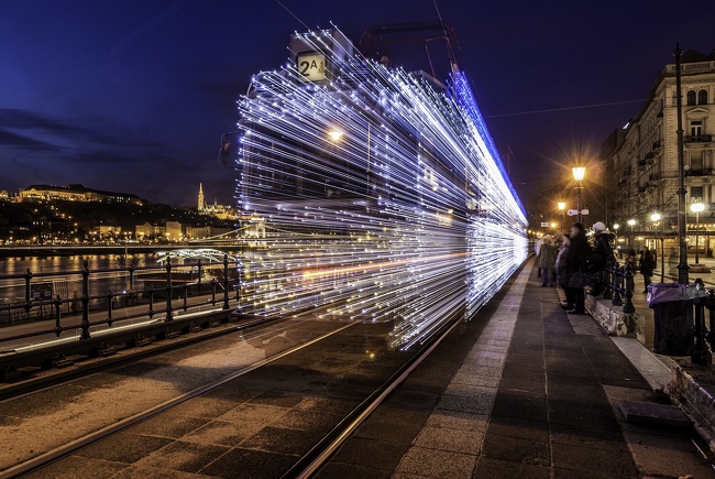 A departing train is covered by 30,000 light emitting diodes