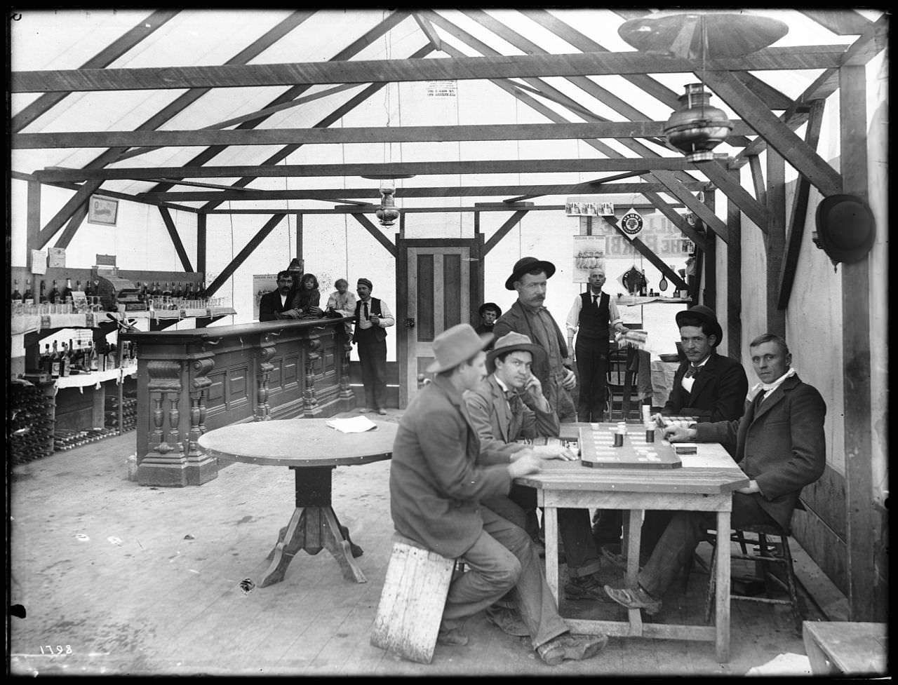 A saloon in a tent in a mining town in California, US in 1900.