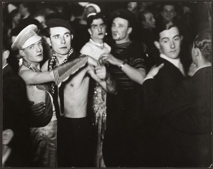 A variety of men dance at an openly gay club in Paris, France in 1933.