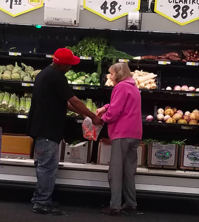 “This man saw that an old lady was having trouble bagging some stuff so he stopped and held her bag open for her.”