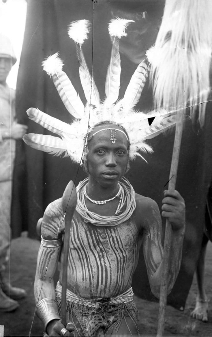 A man prepares for a ritual dance in Kenya in 1902.