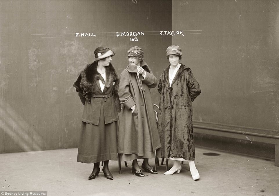 Two women (Elsie Hill, 21, dressmaker Dulcie Morgan, 25, and Jean Taylor, 25) laugh during their mug shots after being arrested during the Darlinghurst flat raid in Sydney, Australia in 1926. Their crime was renting one of the flats, and they were charged with being in the company of persons having no lawful means of support