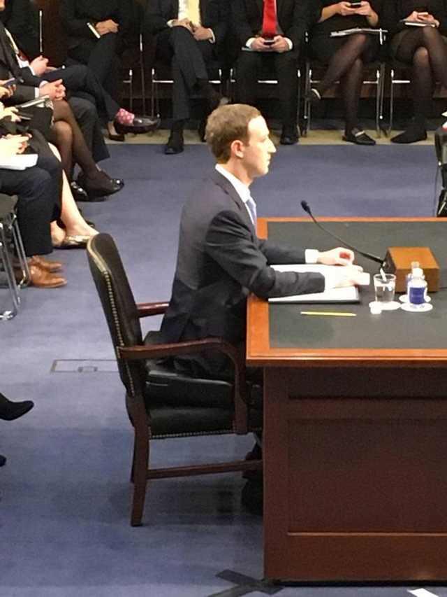 Mark Zuckerberg sitting on a booster