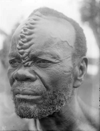 A Boko man from the Congo with his head marked using scarification in 1930.