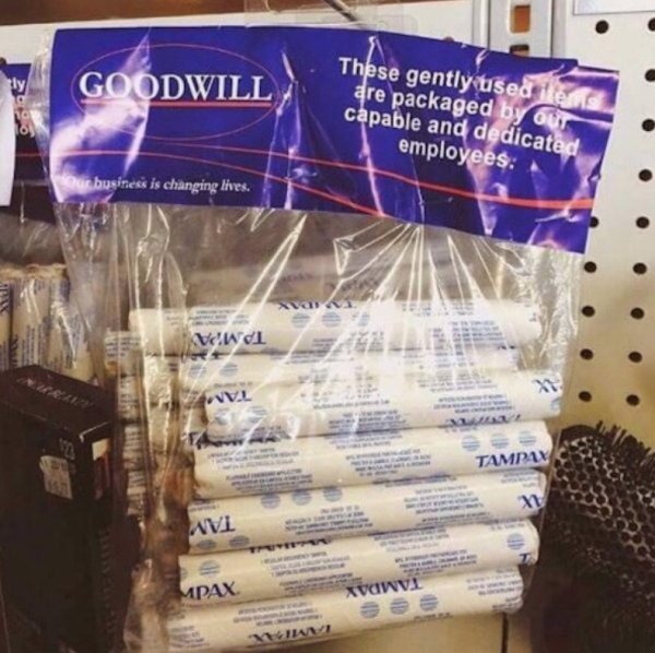 funny thrift store - Goodwill These gently used items are packaged by Out capable and dedicated employees. Qur business is changing lives. Tampla Tampax A Mpax Viwv