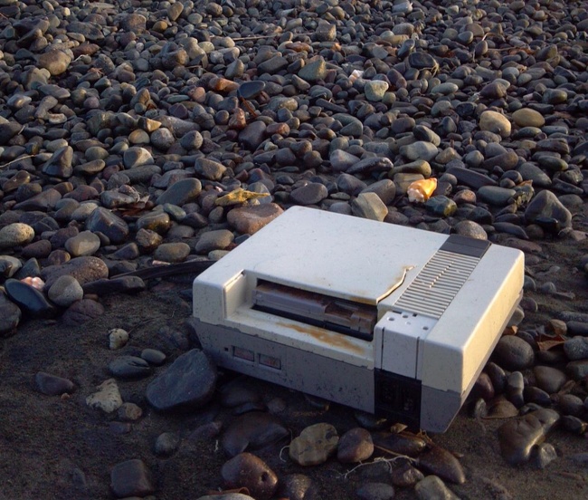 “I found an NES with a game stuck in it washed up on the beach today.”