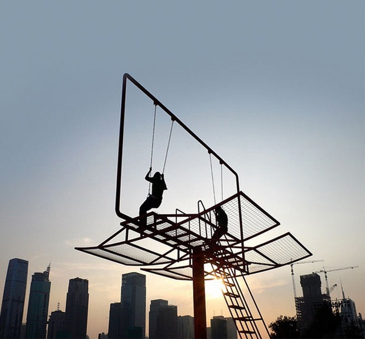 A billboard converted into swings