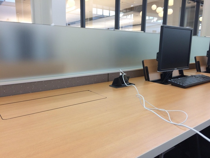 “My local community college has collapsible monitors that can automatically go down so you can have more desk space.”