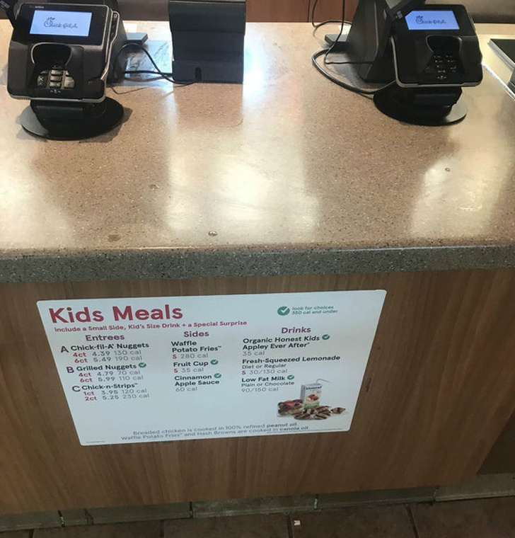 The kid’s menu at Chick-fil-A is at kid’s eye level.