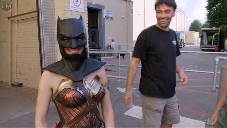 Wonder Woman wearing a Batman mask