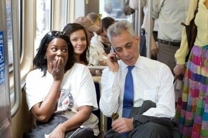 This woman was on a phone job interview when the Mayor of Chicago was right next to her. He took her phone and said a few good things about her.