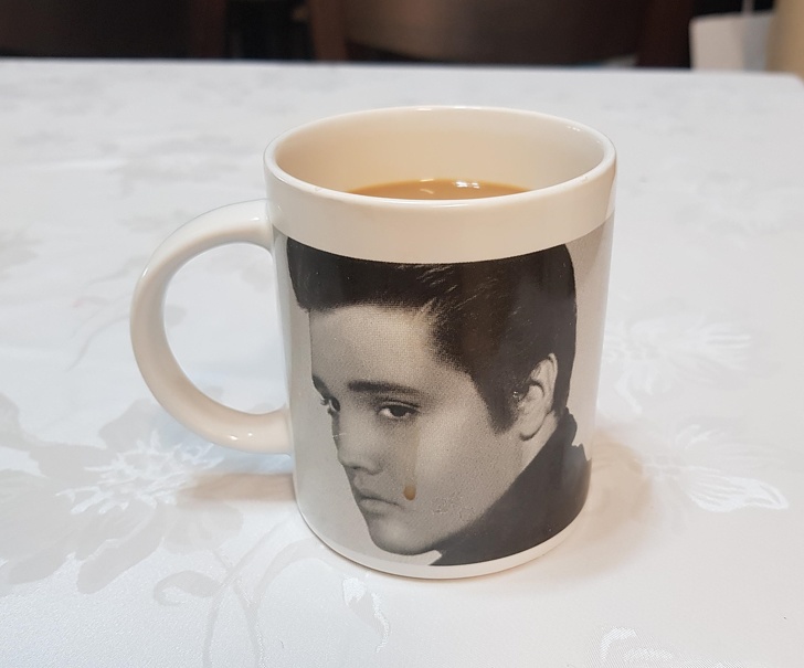 “Spilled my coffee and now Elvis is crying.”
