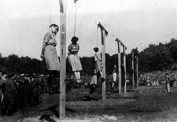 The execution of female guards of the Stutthof concentration camp near the Free City of Danzig in modern Poland in 1946.