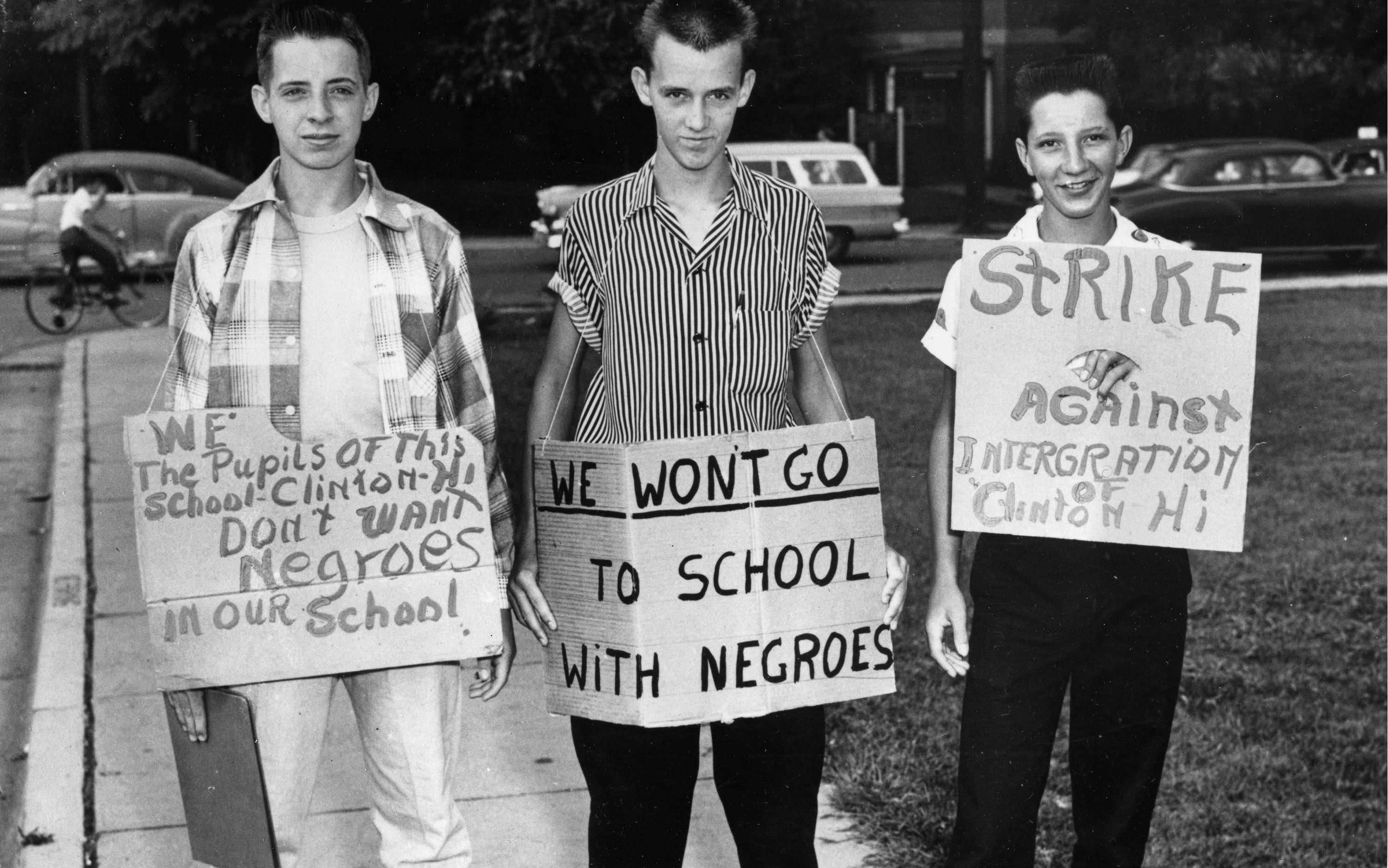 3 Students picketing against integrating Clinton High School in Tennessee, US in 1956. It's ironic the young man on the right can't spell.