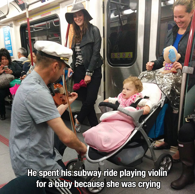 He spent his subway ride playing violin for a baby because she was crying