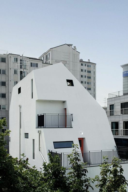 cursed images - white apartment architecture