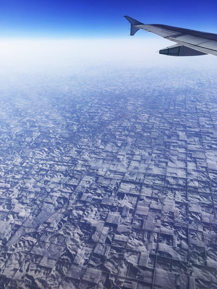 The relief pattern on these snow-covered Iowa fields