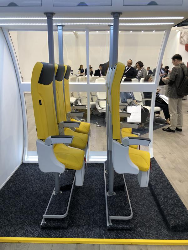 These airline seats are higher so your legs bend at a slight angle, allowing more seats per plane.