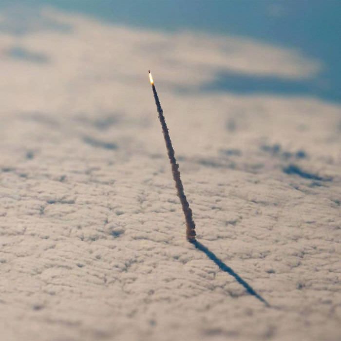 space shuttle leaving earth