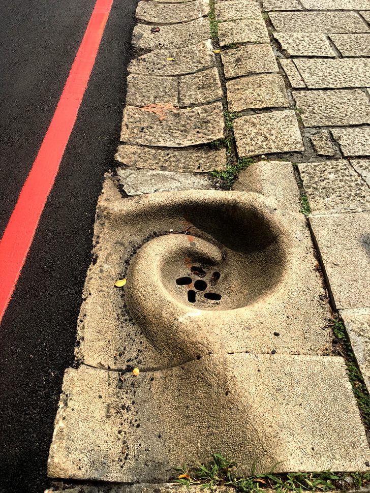“A water current directing drain on a steep slope in Taiwan.”