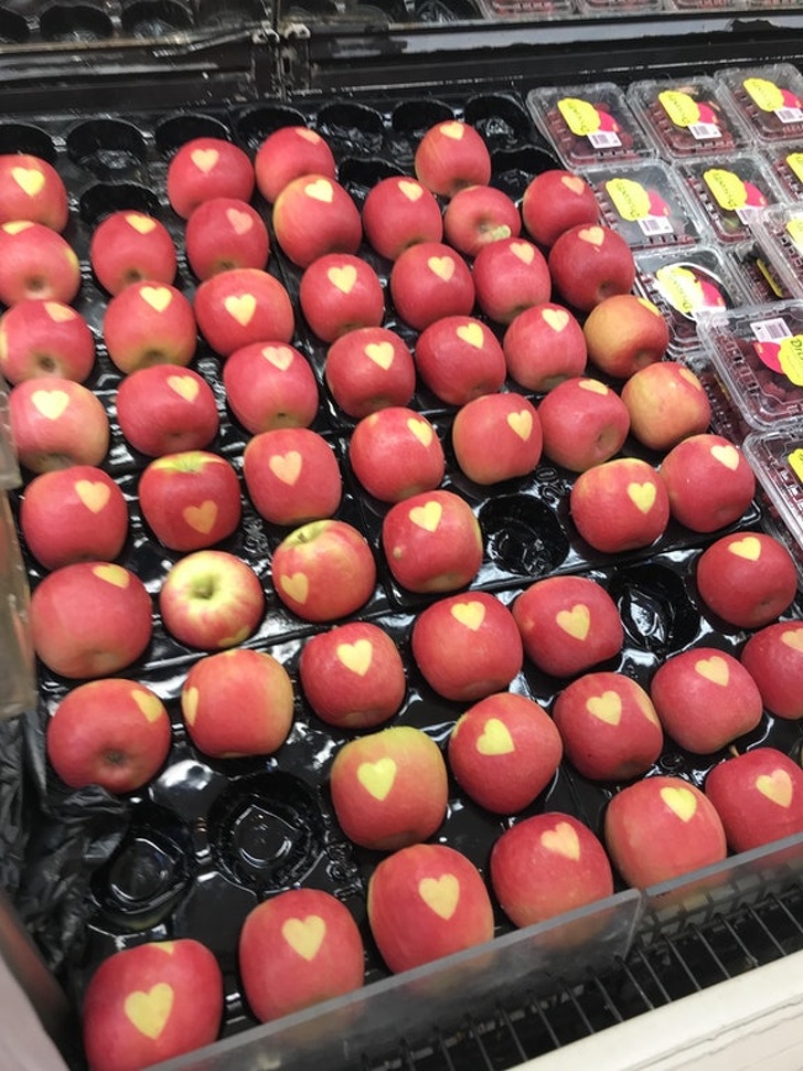 These apples have heart-shaped marks on them.