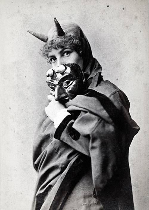 An actress dresses as the devil from an unknown play centering around Faust (the classic story of a German who made a deal with the devil) in France in 1907.