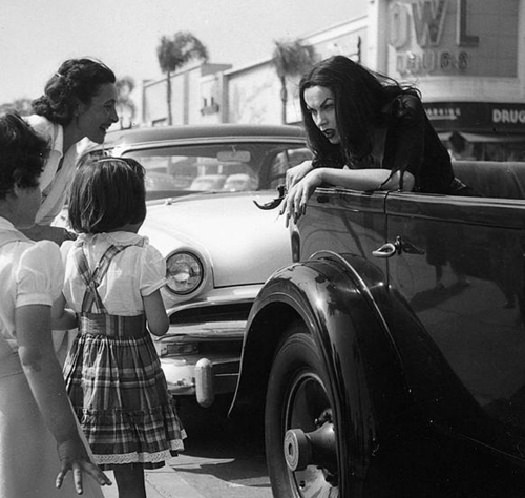 Maila Nurmi as her character Vampira (Ed Woods "Plan 9 From Outer Space" anyone?) interacting with kids in LA, US in 1956.