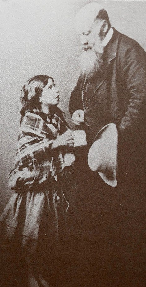 A young beggar no older than 12 receives money from an old man or "caretaker" in London, England in 1876. Pictures like these were shown to members of Parliament in the late 1800s to showcase the rampant problem of child poverty in London. The pictures included rag tag children sleeping in streets, a well known pregnant 10 or 11 year old prostitute, known groups of children thieves, and other similar pictures (that are easy to find, but poor quality pictures). Also, at least 2 members of Parliament in the late 1800s were also known to be "caretakers".