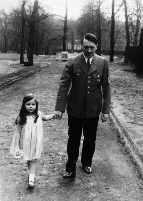 Adolf Hitler with Joseph Goebbels daughter Helga in Germany in 1936. Hitler was close with all 6 of the young Goebbels children right up until his death on April 30th, 1945. The next day, the Goebbels killed all 6 of their children (the eldest was 13) and then themselves. A surviving adult child of Magda Goebbels, Harald Quandt, survived the war and was not present to possibly stop what his mother and step father did.