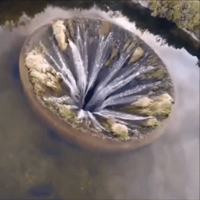 A hole in the middle of a lake in Portugal