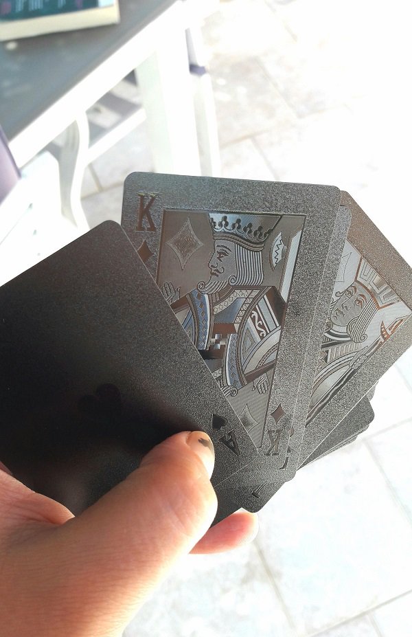 These jet black playing cards.