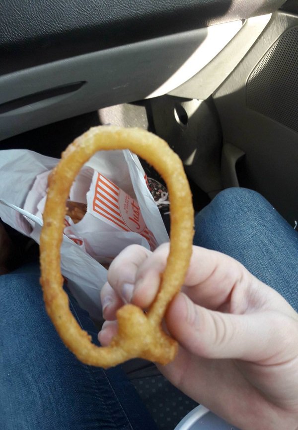 This onion ring is in the shape of a “Q”.