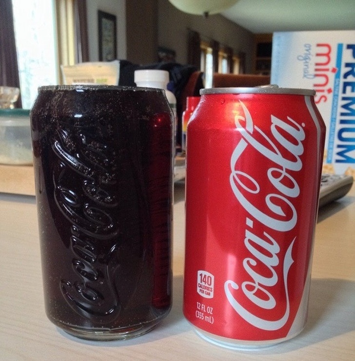 This glass holds exactly one can of soda right to the brim.