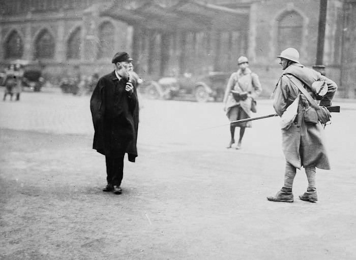 A German citizen stares down a French soldier part of the occupying force of Essen in Germany in 1918.