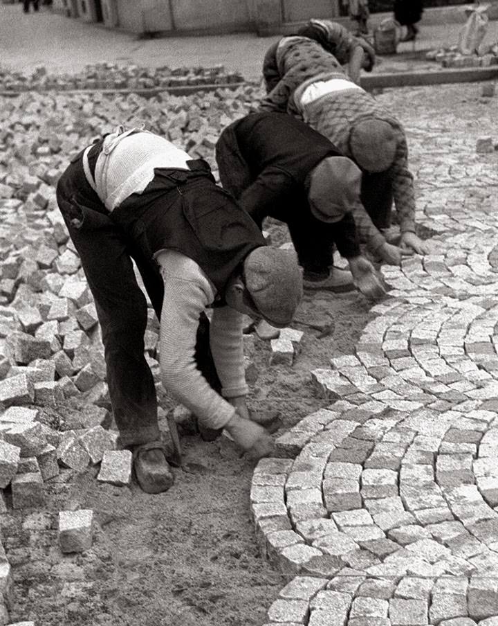 Making a road by hand in Paris, France in 1933.