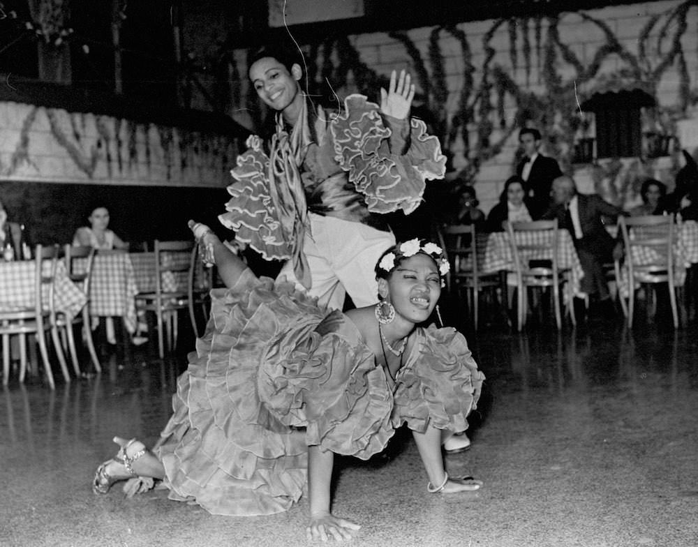 2 Dancers perform in a club in Havana, Cuba in 1949.