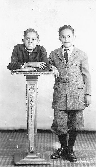 Johnny and Robert Eck posing for a picture in the US in 1922. Johnny was born without the lower half of his torso.
