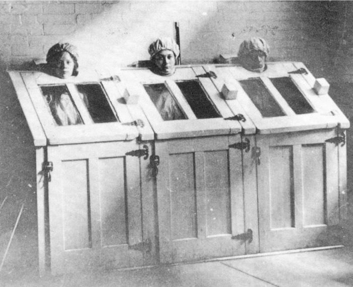 Patients receive treatment while restrained in a steam box in Milledgeville State Hospital in Georgia, US in 1908.