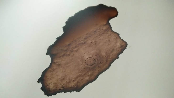 This coffee stain looks like a lunar landscape.
