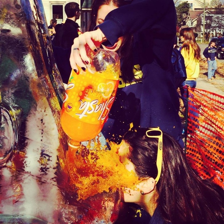 “My one friend ‘helping’ my other friend use an ice luge to drink at a party...”